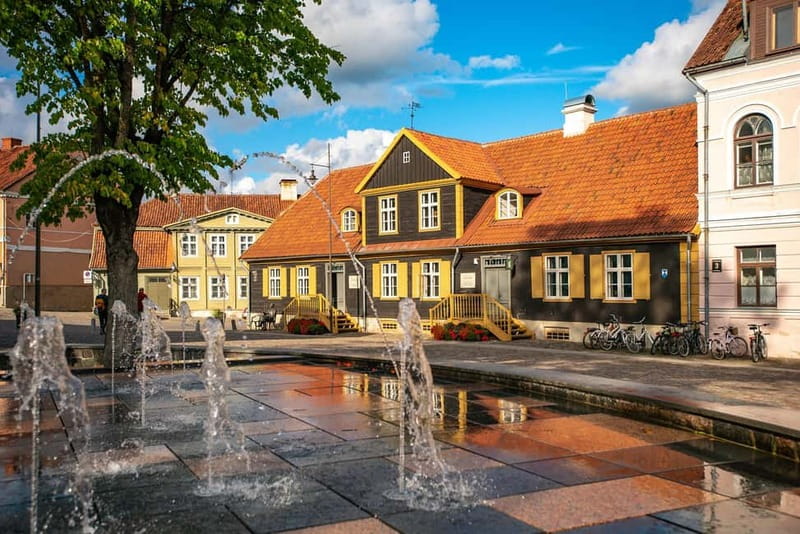 From Riga: Kuldiga UNESCO, Waterfall & Wine Day Trip - Old bridge viewpoints and Kuldiga’s medieval rhythm