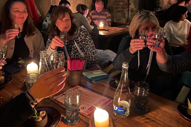 Medieval Experience: Guided Sightseeing and Food Tasting - Riga Old Town at night, guided and practical