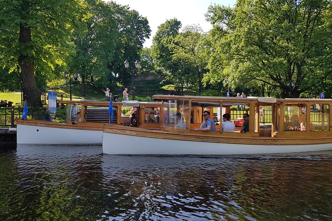 Riga City Canal & Daugava River Premium Boat Tour with Audioguide - Big Christopher, Riga Castle, and the river heritage story