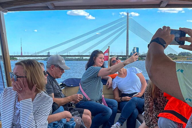Riga Sightseeing Tour by Canal Boat with Audioguide - Latvian National Theater and Opera: Big Buildings, New Angles