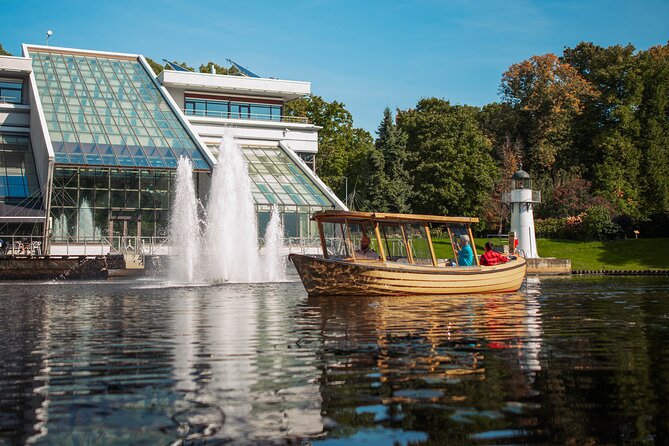 Riga Sightseeing Tour by Canal Boat with Audioguide - The Audioguide Setup: English, Languages, and Headphones